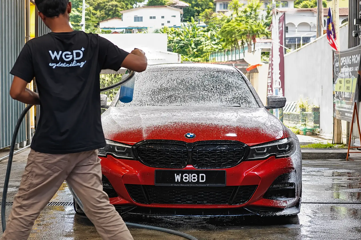 WG Detailing technician applying foam during a premium wash at Old Klang Road