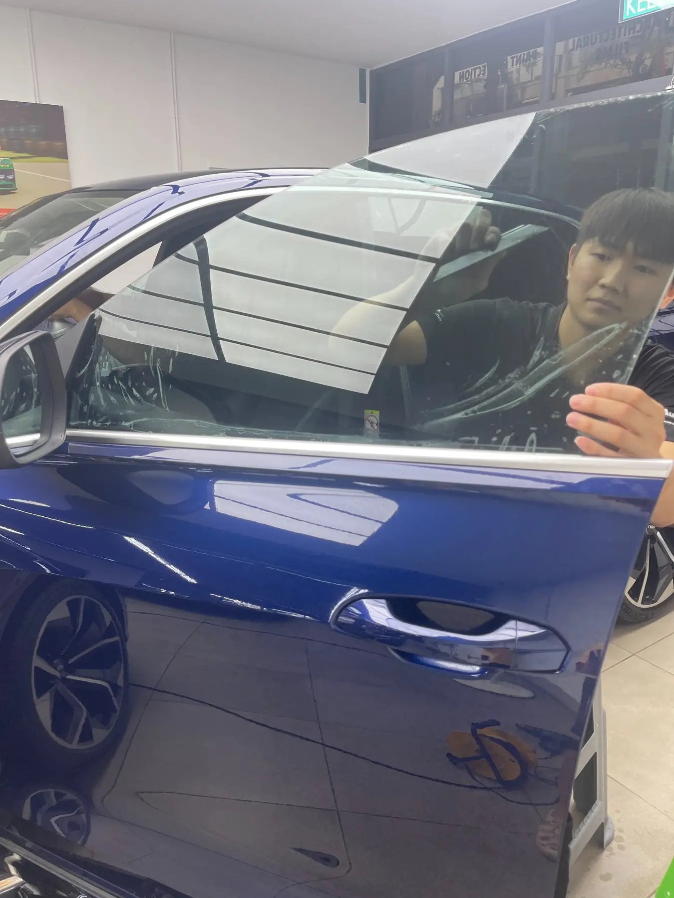 Automotive window film installation at WG Detailing